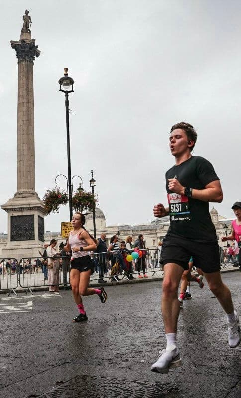 Running a road marathon.